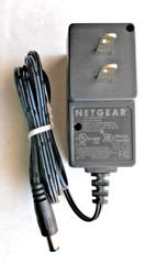 NETGEAR P/N: 332-10688-01 MODEL: MU06-N120050-A1 AC/DC ADAPTER 12V 0.5A J3.1